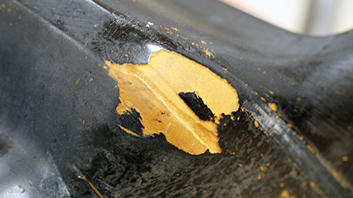 Detail of worn spots on the front bumper